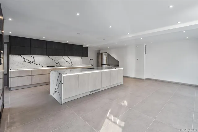 a view of a kitchen with a sink