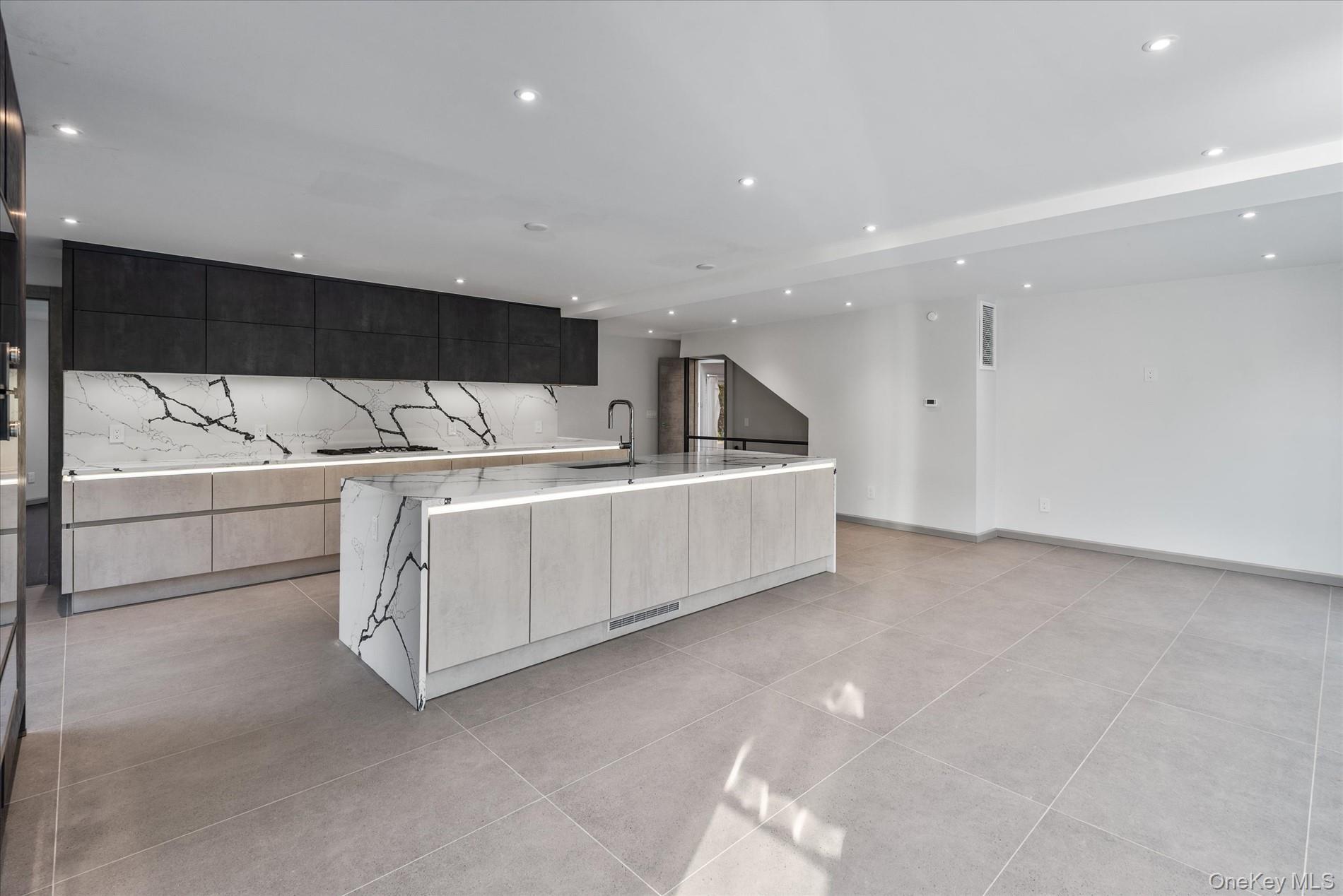 369 East Shore Road Great Neck, NY 11023 - Photo 18 of 50 a view of a kitchen with a sink