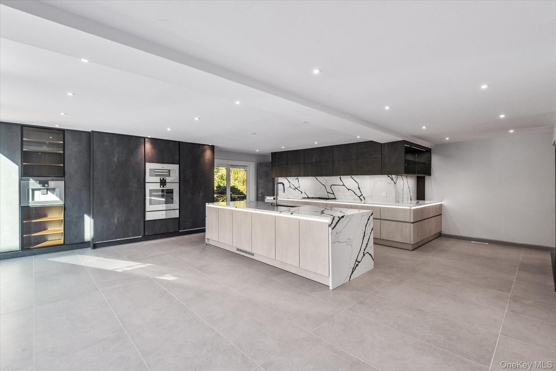 369 East Shore Road Great Neck, NY 11023 - Photo 20 of 50 a view of a room with furniture and window