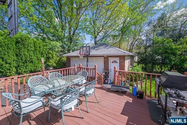 an outdoor space with furniture and umbrella