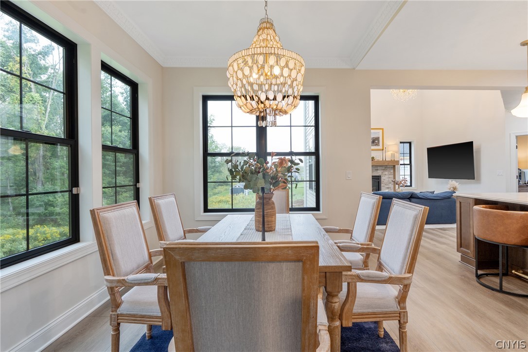 2020 Rubicon Road Lysander, NY 13027 - Photo 21 of 49 A wonderful place to host those holiday dinners coming up. The highlight being the Gorgeous Cadiz oyster shell chandelier from Anthropologie.