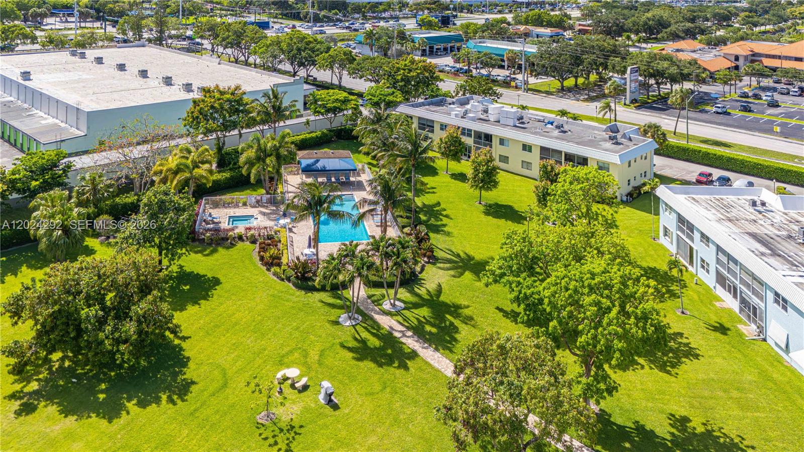 9780 Marina Boulevard, Unit 424 Boca Raton, FL 33428 - Photo 32 of 32 an aerial view of residential houses with outdoor space