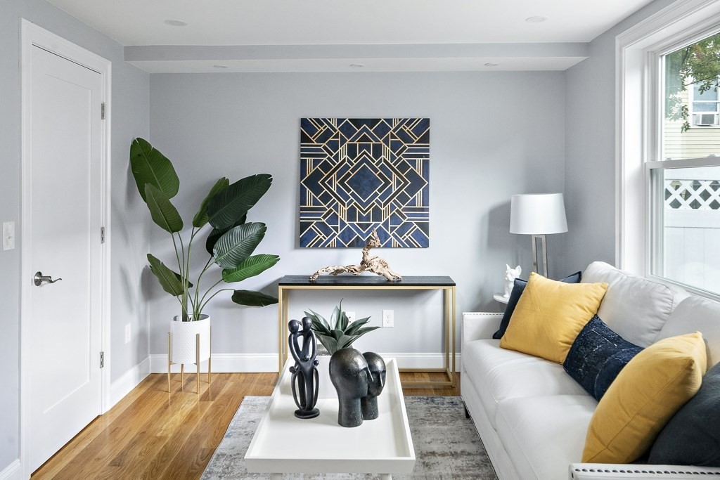 4 Spring St Place Cambridge, MA 02141 - Photo 2 of 12 a living room with furniture flowerpot and window