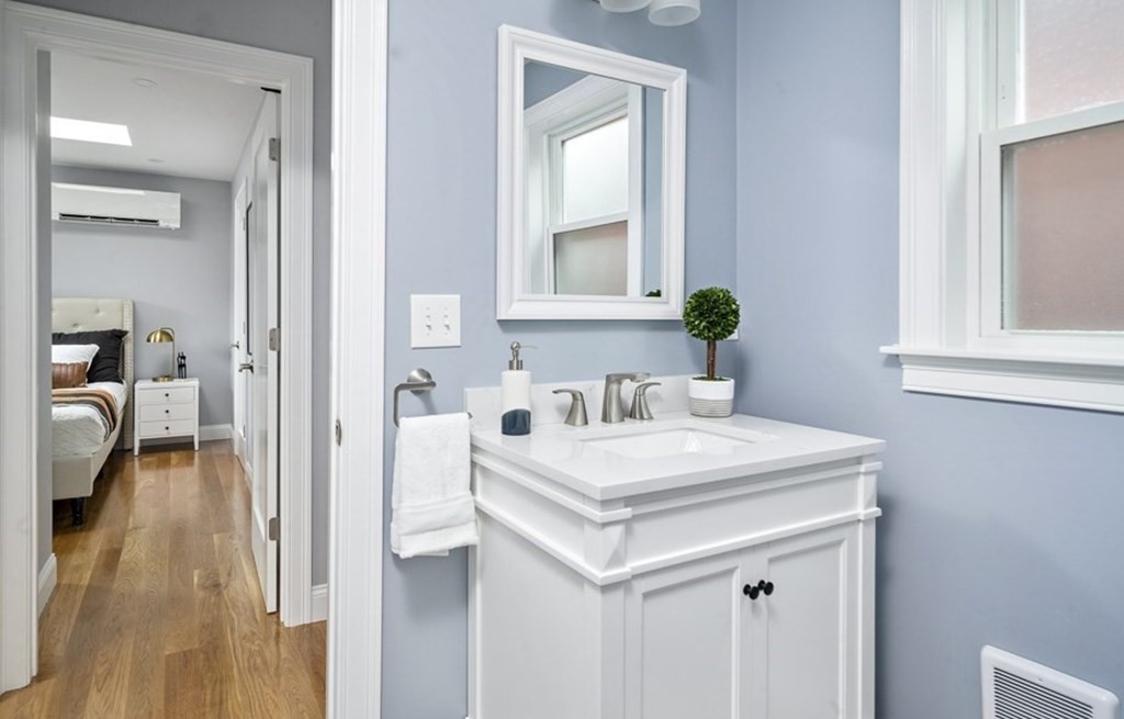 4 Spring St Place Cambridge, MA 02141 - Photo 9 of 12 a view of a kitchen from the hallway