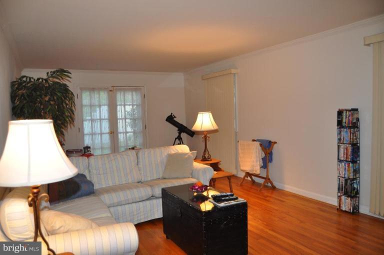 10507 Gateridge Road Cockeysville, MD 21030 - Photo 14 of 18 a living room with furniture and wooden floor