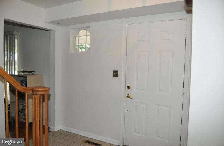 10507 Gateridge Road Cockeysville, MD 21030 - Photo 3 of 18 a view of a hallway with front door