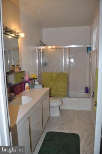 10507 Gateridge Road Cockeysville, MD 21030 - Photo 7 of 18 a bathroom with a sink a toilet and shower