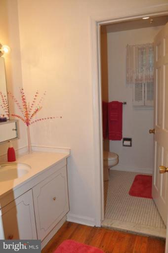 10507 Gateridge Road Cockeysville, MD 21030 - Photo 8 of 18 a bathroom with a sink and a mirror