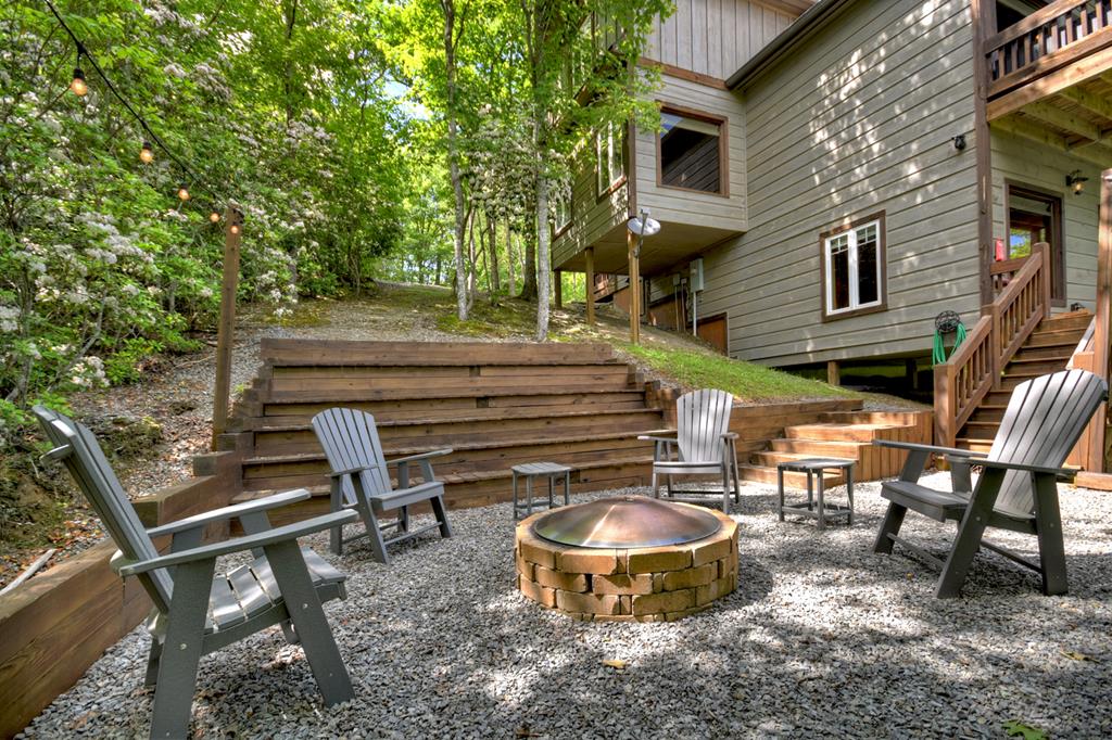 80 Tom Tom Trail Blue Ridge, GA 30513 - Photo 32 of 67 a view of a chairs and table in backyard