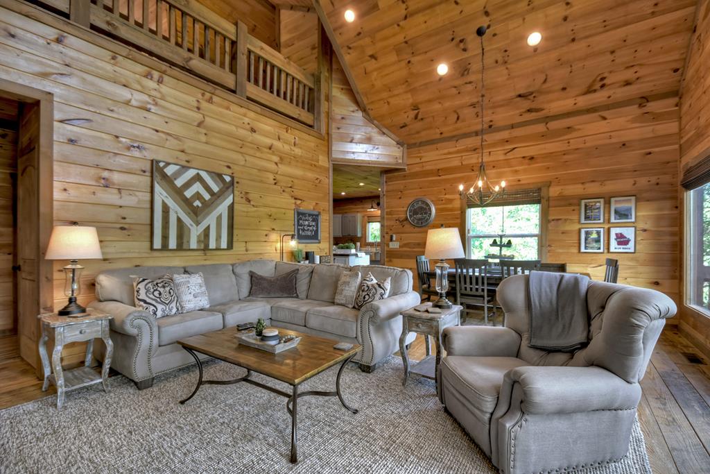 80 Tom Tom Trail Blue Ridge, GA 30513 - Photo 63 of 67 a living room with furniture and a ceiling fan