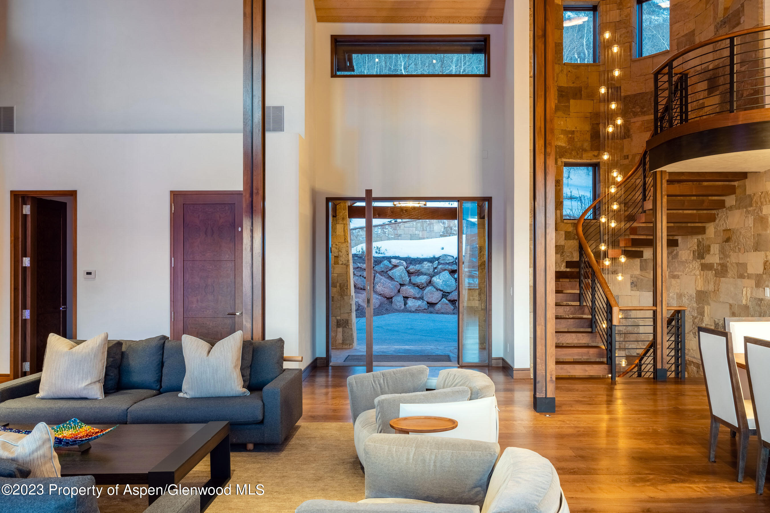 70 Larson Road Aspen, CO 81612 - Photo 10 of 55 a living room with furniture and a wooden floor