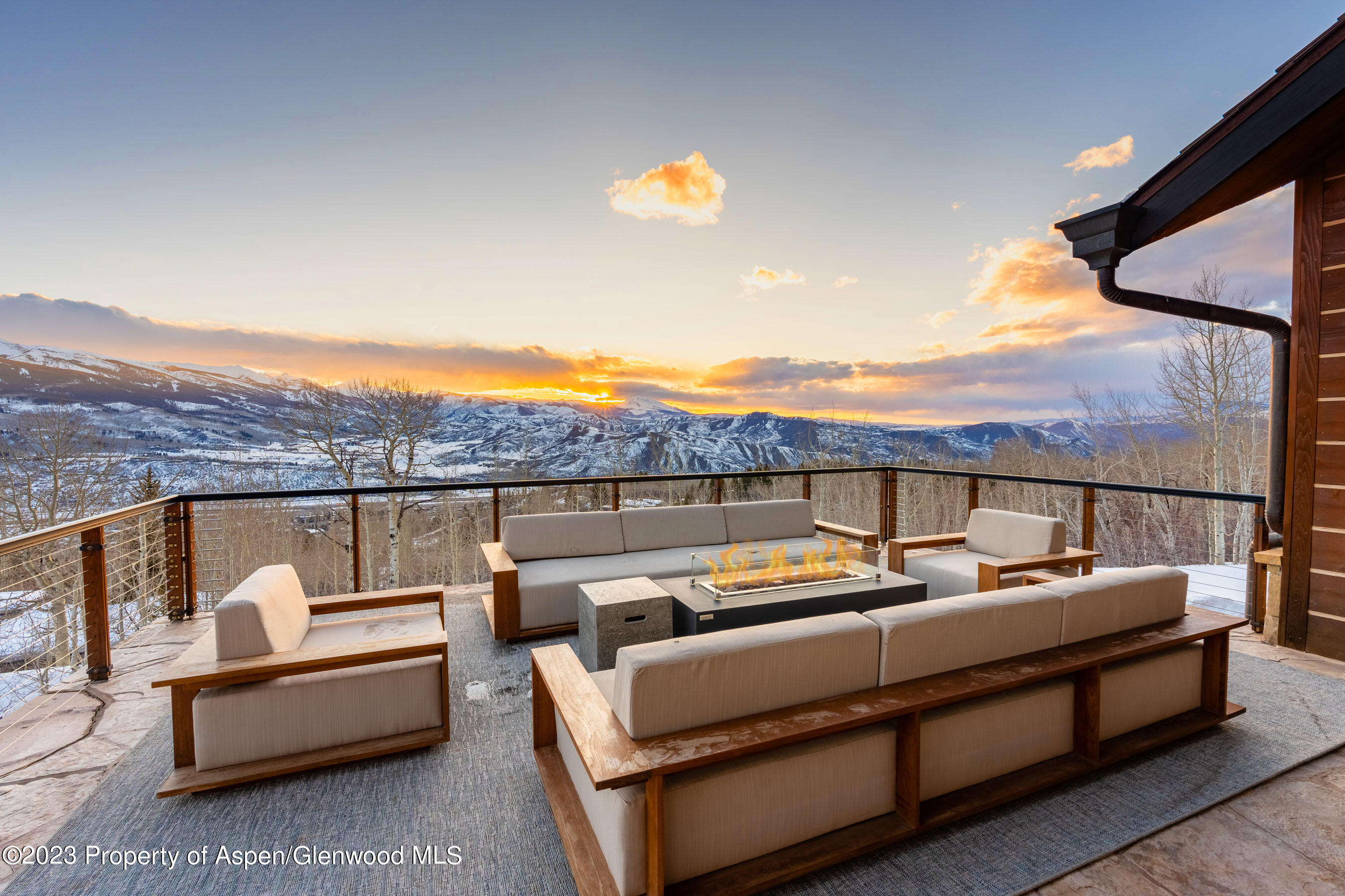 70 Larson Road Aspen, CO 81612 - Photo 14 of 55 a outdoor sitting area with furniture and city view