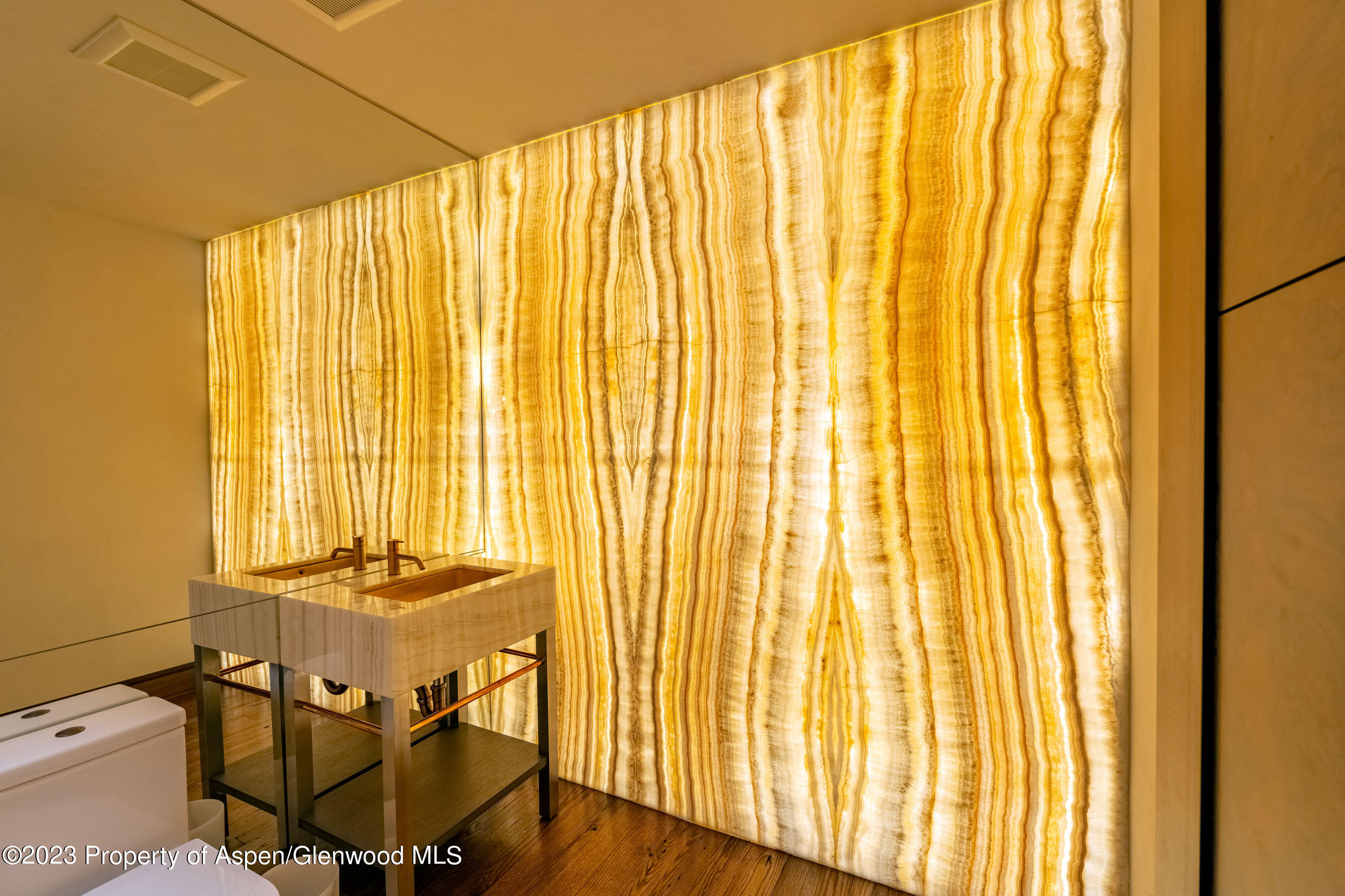 70 Larson Road Aspen, CO 81612 - Photo 20 of 55 a view of a dining room with furniture and a window
