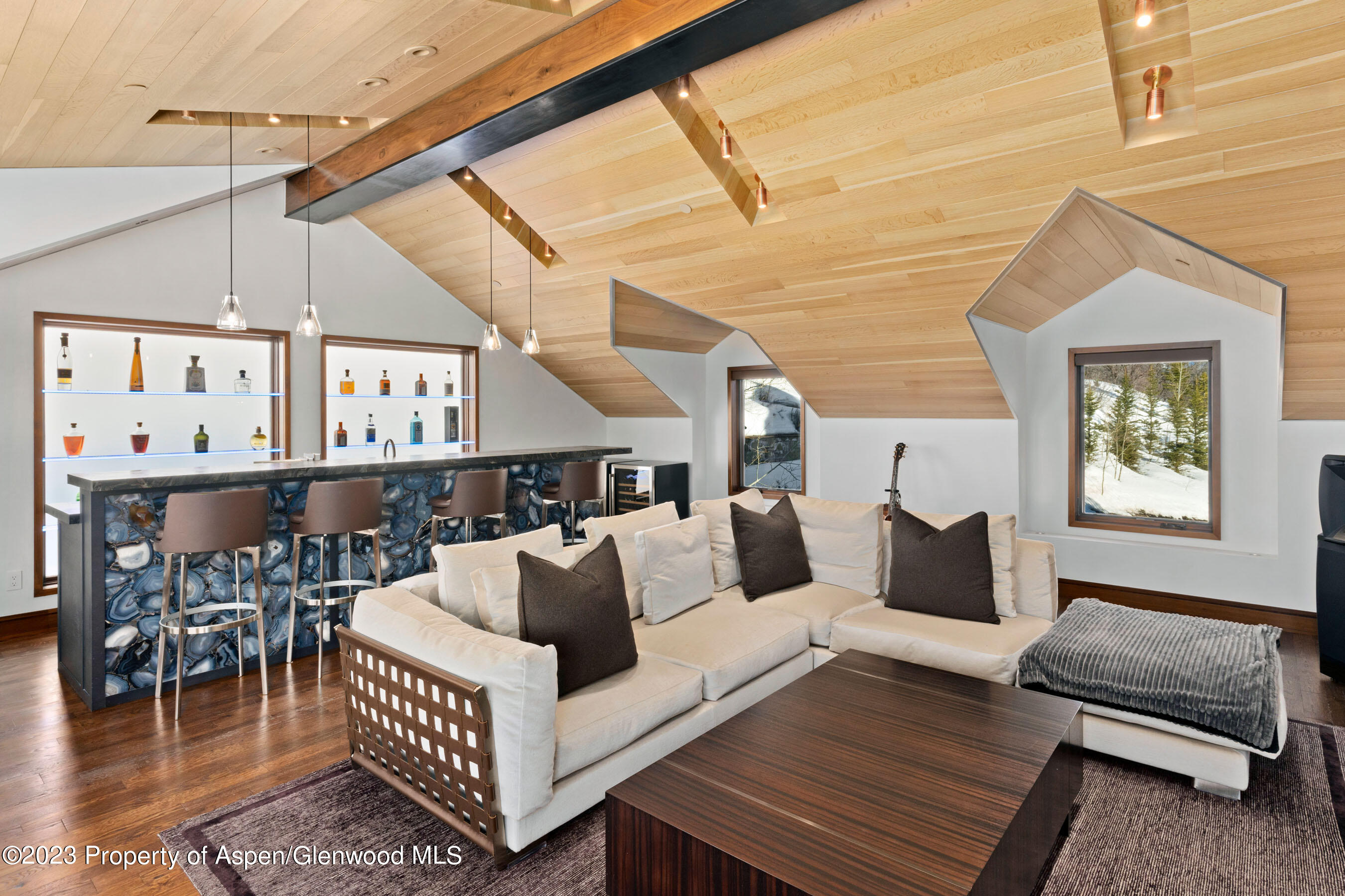 70 Larson Road Aspen, CO 81612 - Photo 32 of 55 a living room with furniture and a rug
