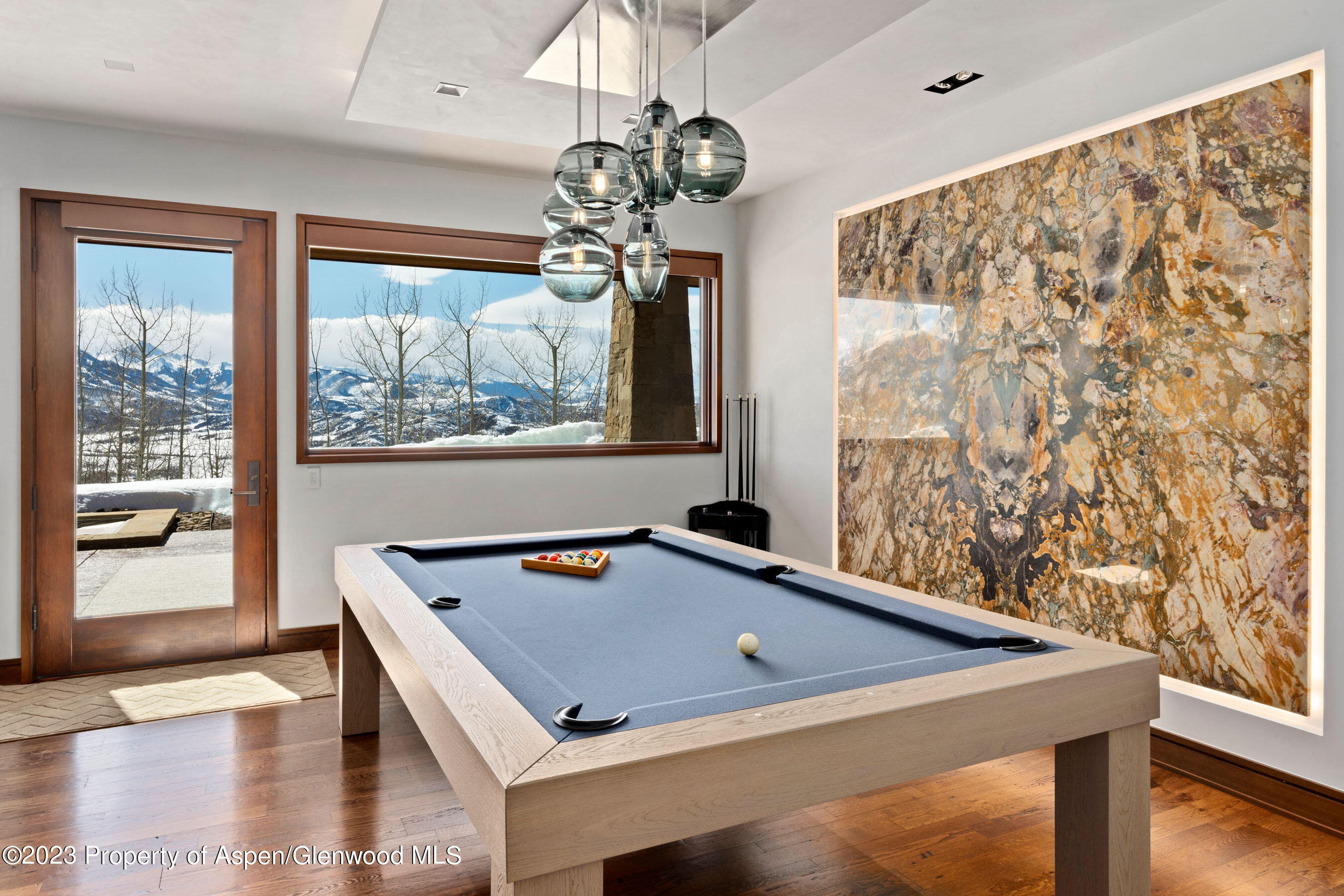 70 Larson Road Aspen, CO 81612 - Photo 41 of 55 a room with pool table and windows
