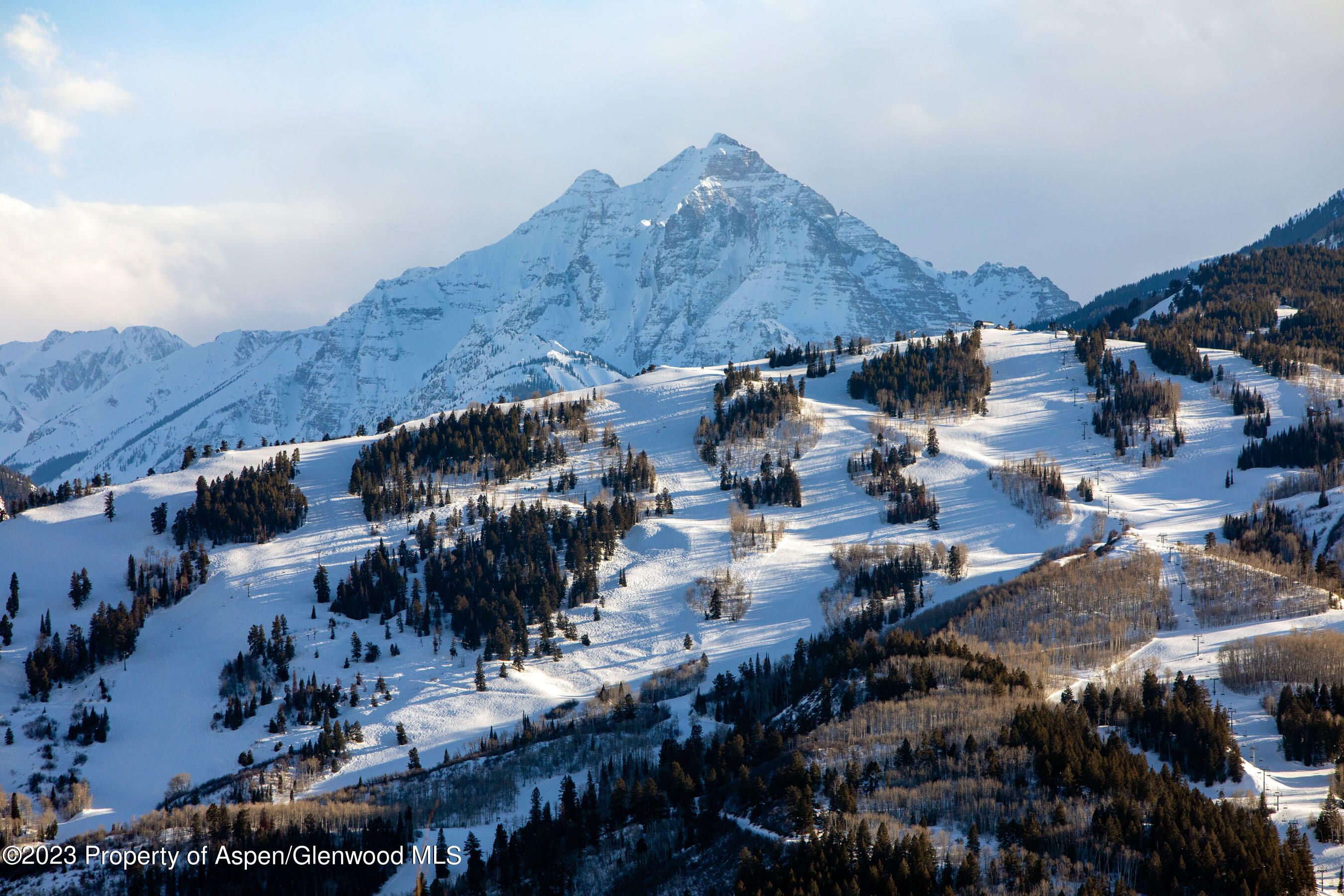 70 Larson Road Aspen, CO 81612 - Photo 46 of 55 a view of a houses with a mountain