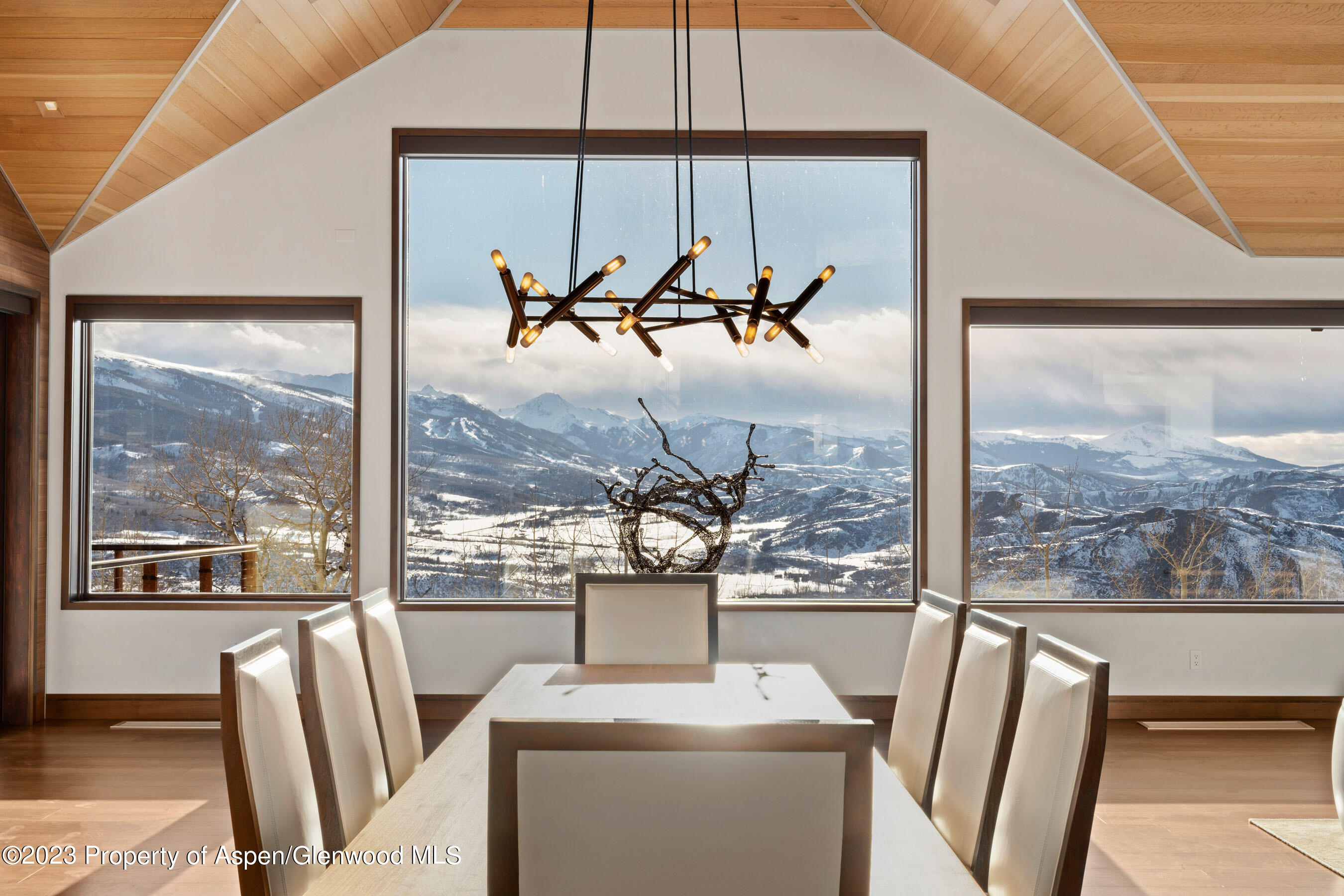 70 Larson Road Aspen, CO 81612 - Photo 4 of 55 a view of a room with a large window and furniture