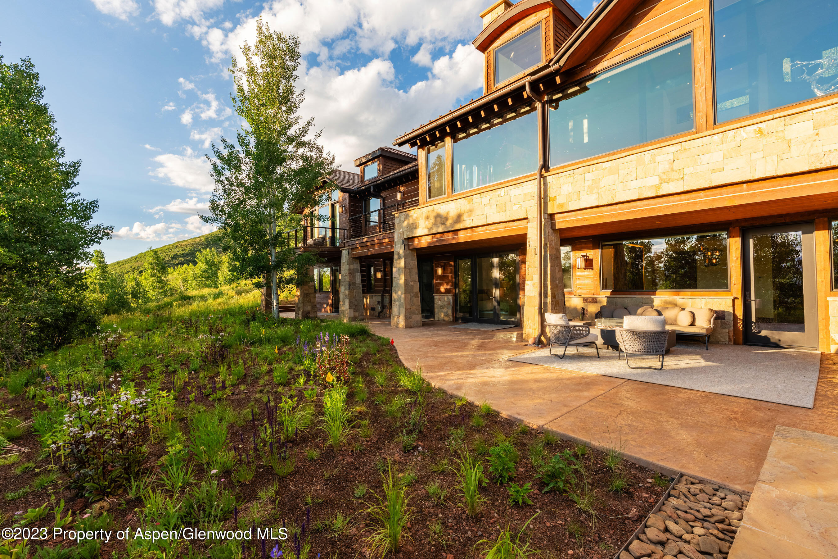 70 Larson Road Aspen, CO 81612 - Photo 52 of 55 a view of a building with sitting area