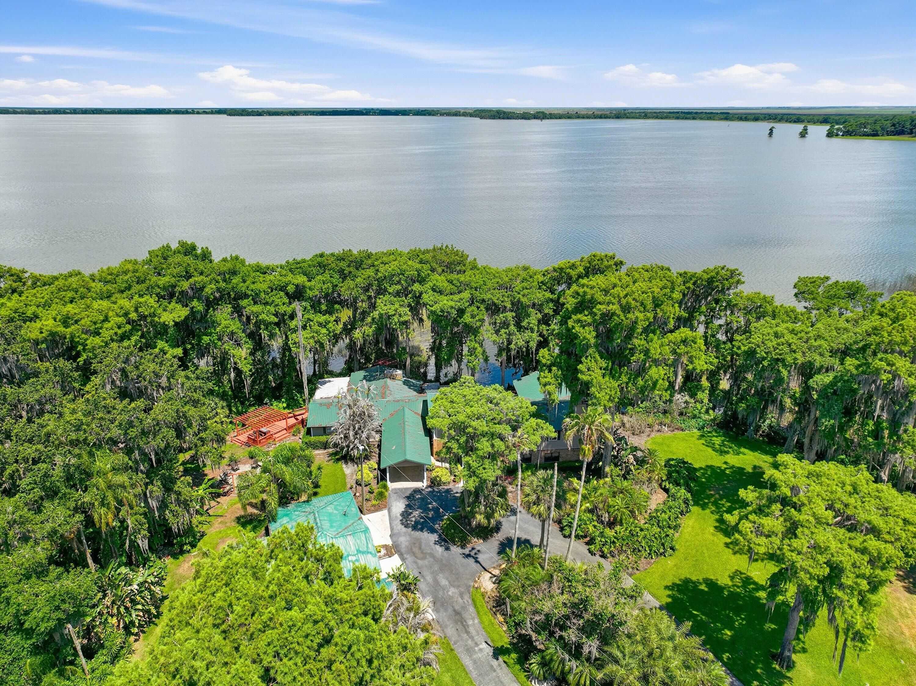 200 Windy Point Road Lake Placid, FL 33852 - Photo 64 of 74 a view of a lake with a lake