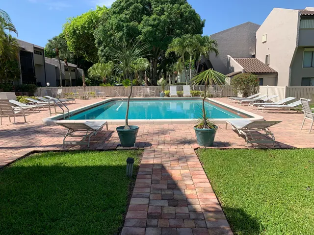 a bathroom with a shower and a toilet
