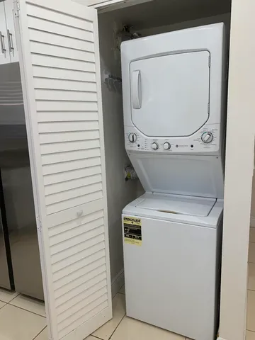 a view of an entryway with a chandelier