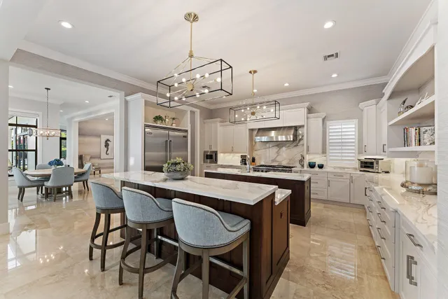 a kitchen with cabinets a sink and appliances