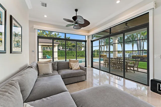 a bathroom with a sink toilet and window