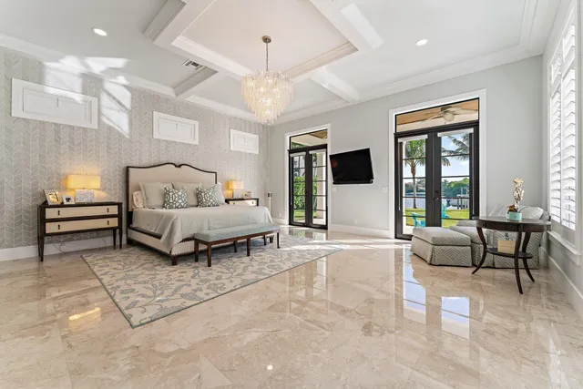 a spacious bedroom with a large bed and a couch