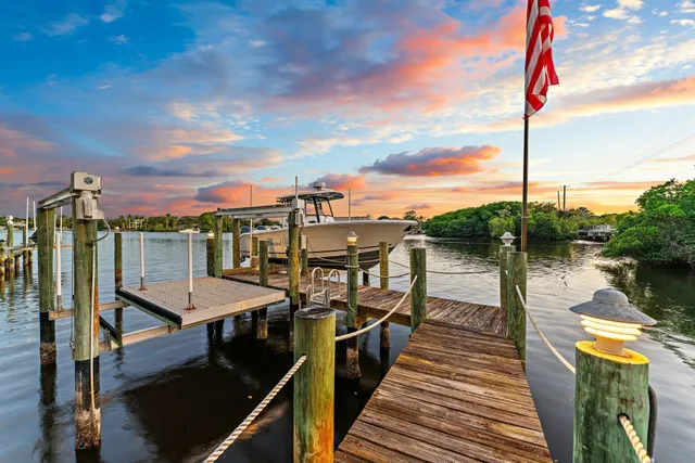 a view of swimming pool with seating area and slide