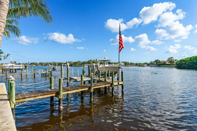 a view of swimming pool with outdoor seating