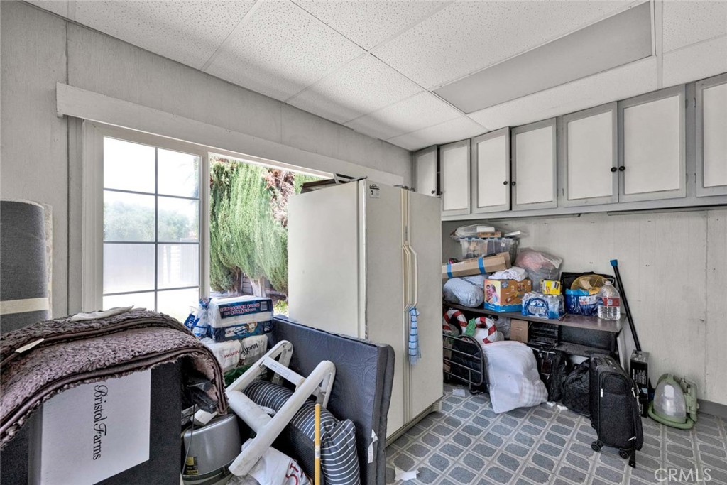 5456 Cadbury Road Whittier, CA 90601 - Photo 56 of 67 a view of a workspace with furniture and a window