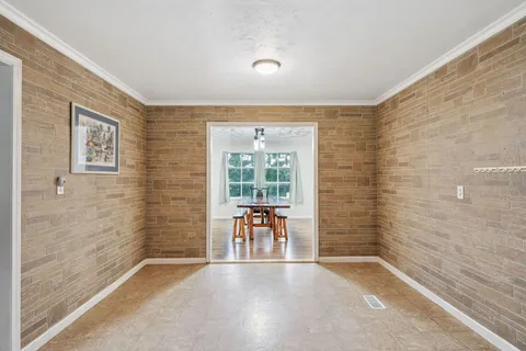 a view of a livingroom with a furniture and a window