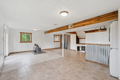 a bathroom with sink a mirror and a bathtub