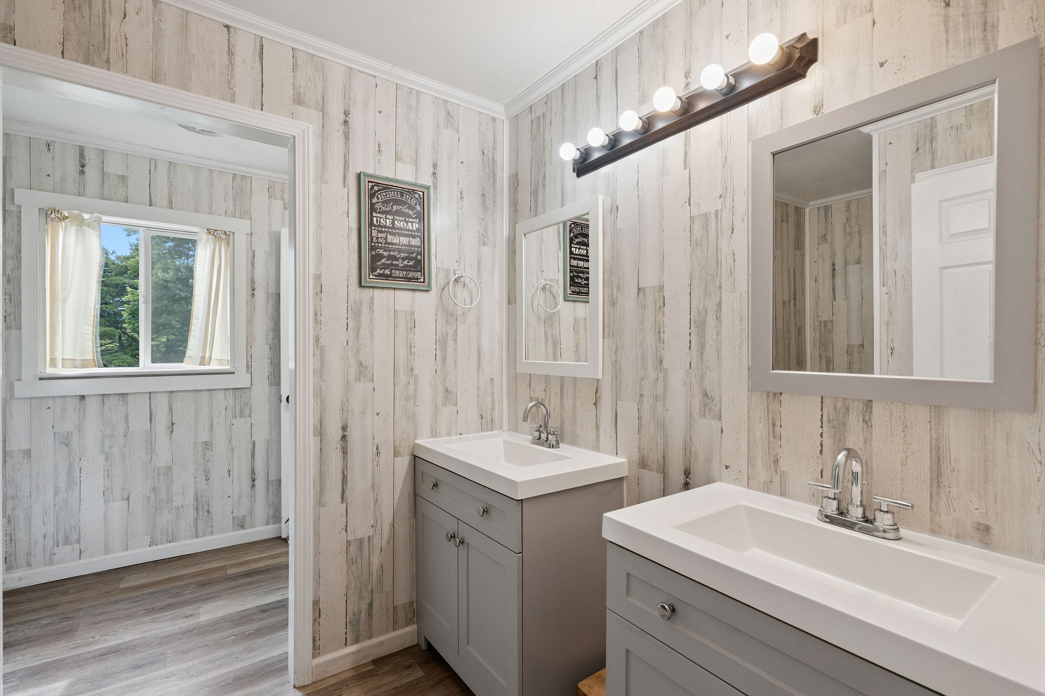 3037 Tunnel Road Westmoreland, TN 37186 - Photo 25 of 53 a bathroom with a sink and a mirror