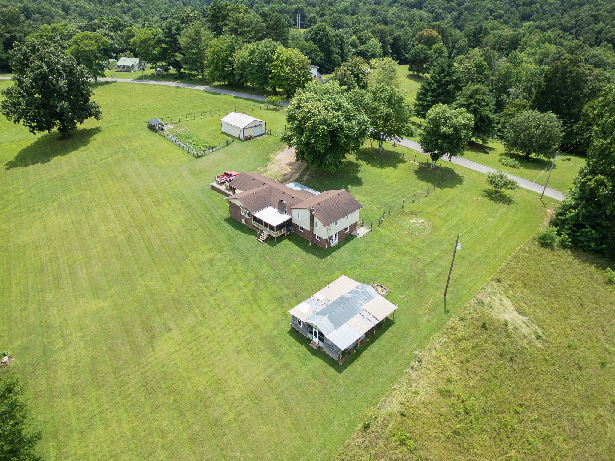 3037 Tunnel Road Westmoreland, TN 37186 - Photo 48 of 53 a swimming pool with some trees in the background