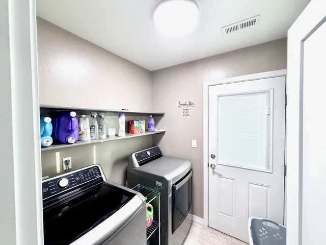 a kitchen with a stove and a cabinets