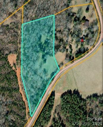0 Coxe Road, Unit LOT 3 Tryon, NC 28782 - Photo 4 of 4 a view of a garden with a plant in a patio