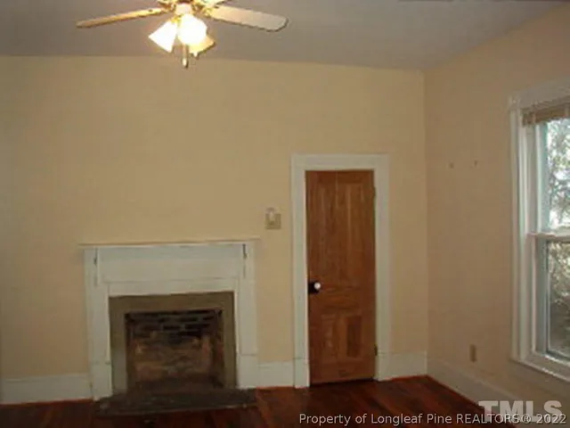a view of a livingroom with a fireplace