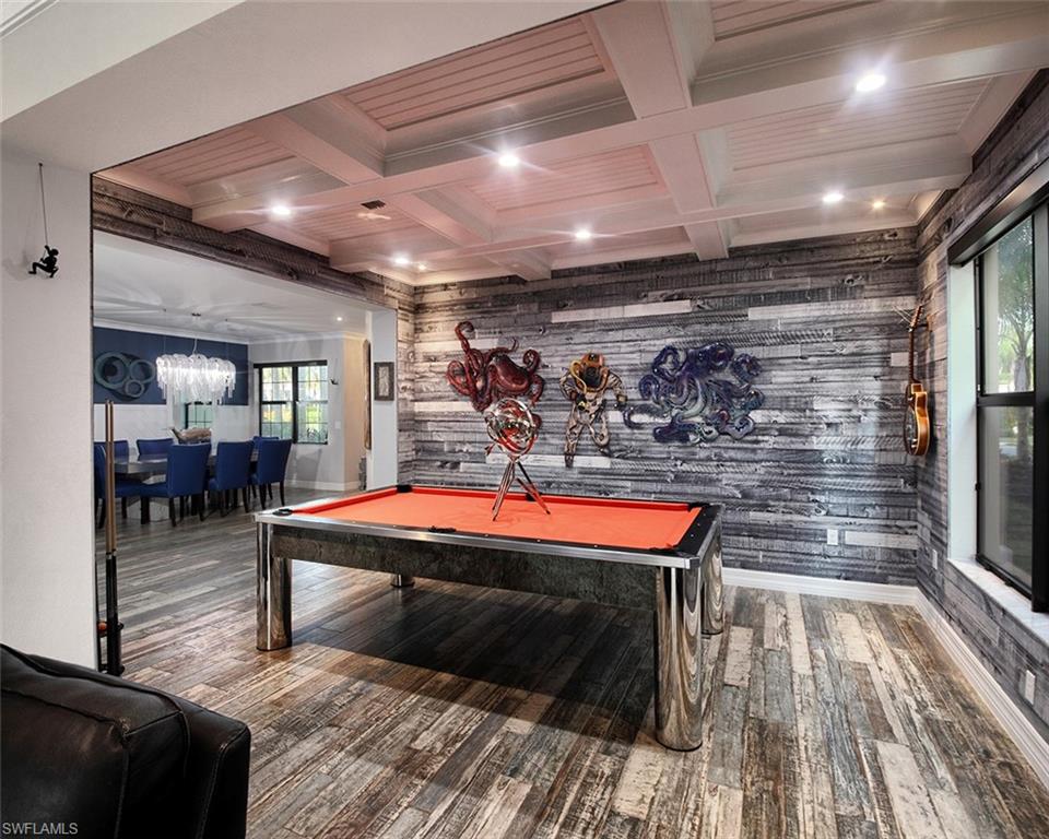 13693 Mandarin Circle Naples, FL 34109 - Photo 7 of 29 a room with furniture