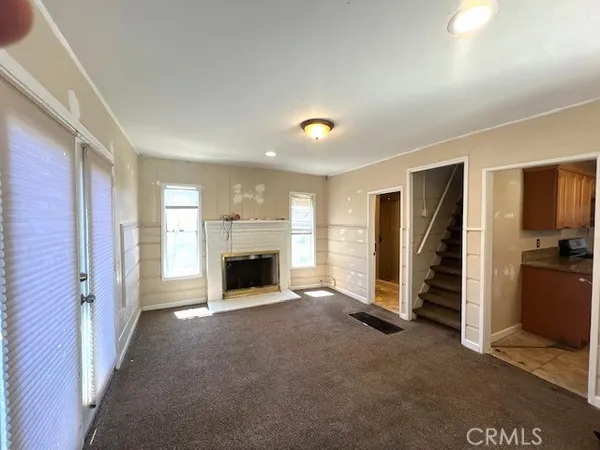 a view of a livingroom with a fireplace