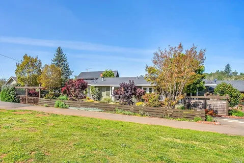 a swimming pool view with a outdoor seating