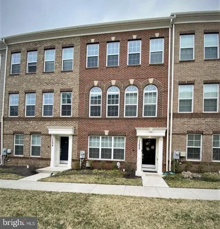 a front view of a brick building