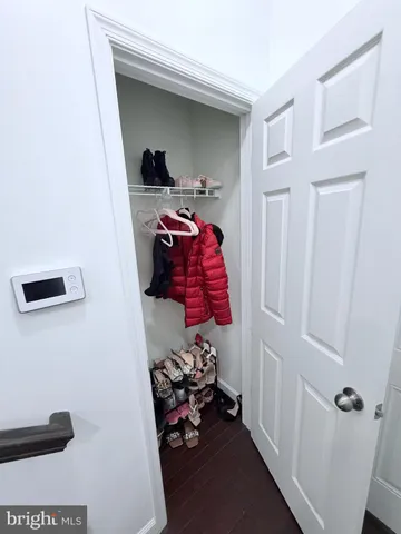 a room with a window and gym equipment