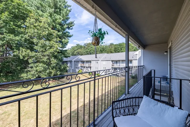 a view of balcony with furniture
