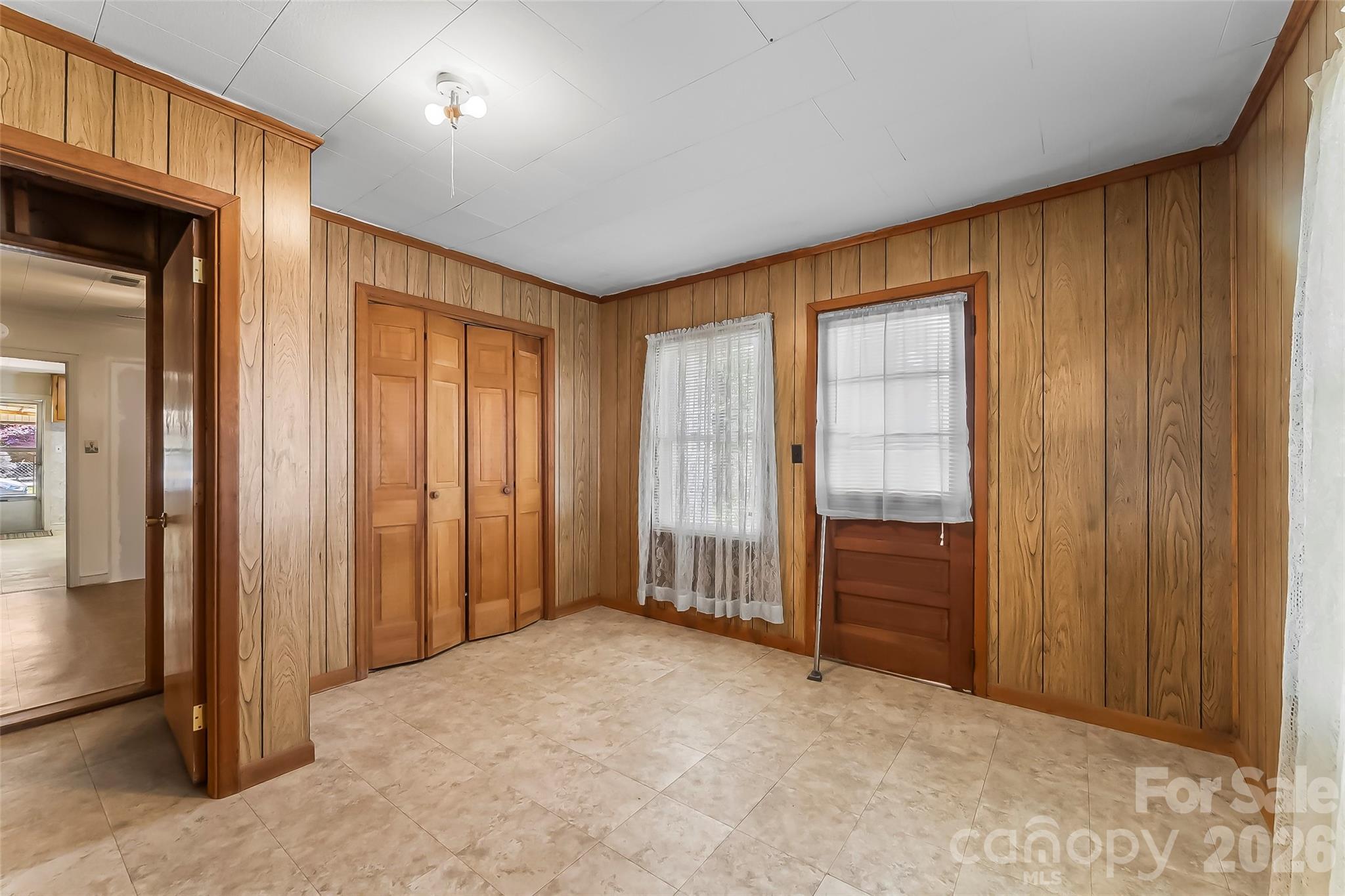 428 Melrose Street Southwest Lenoir, NC 28645 - Photo 14 of 34 an empty room with closet and a window