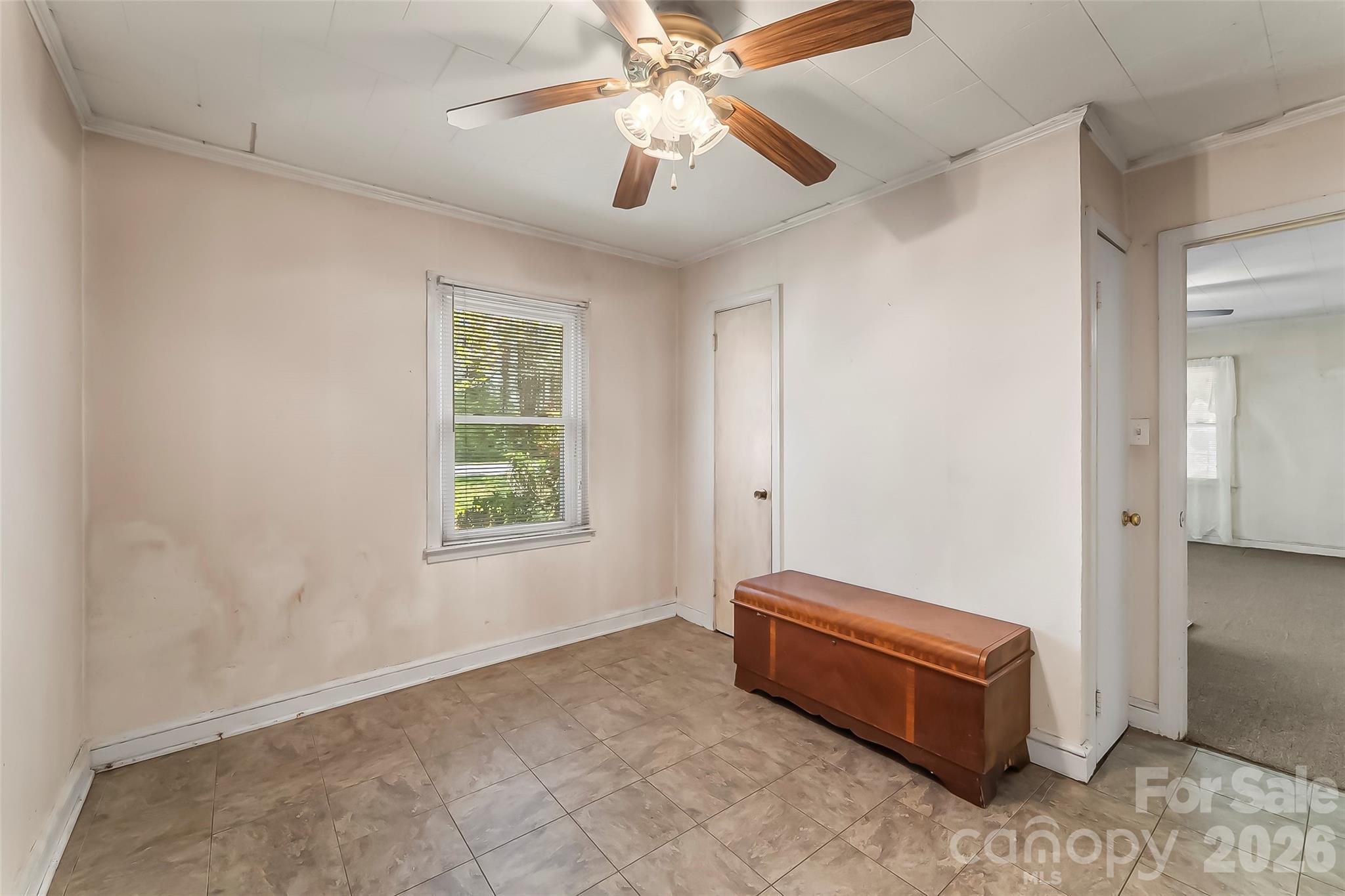 428 Melrose Street Southwest Lenoir, NC 28645 - Photo 20 of 34 a room with windows and ceiling fan