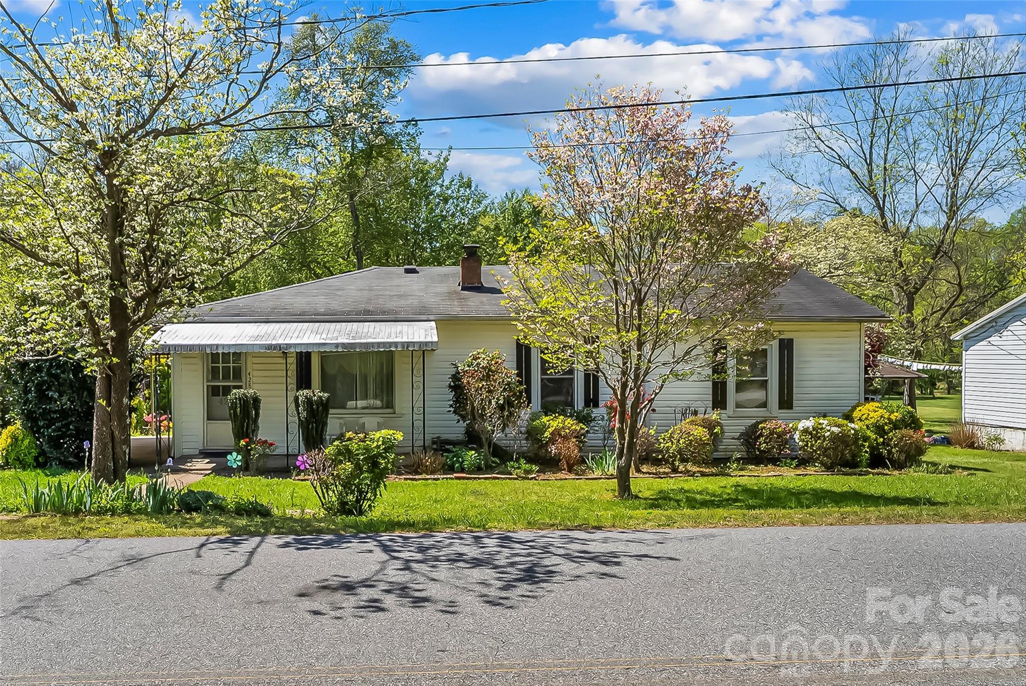 428 Melrose Street Southwest Lenoir, NC 28645 - Photo 2 of 34 a view of a house with a garden
