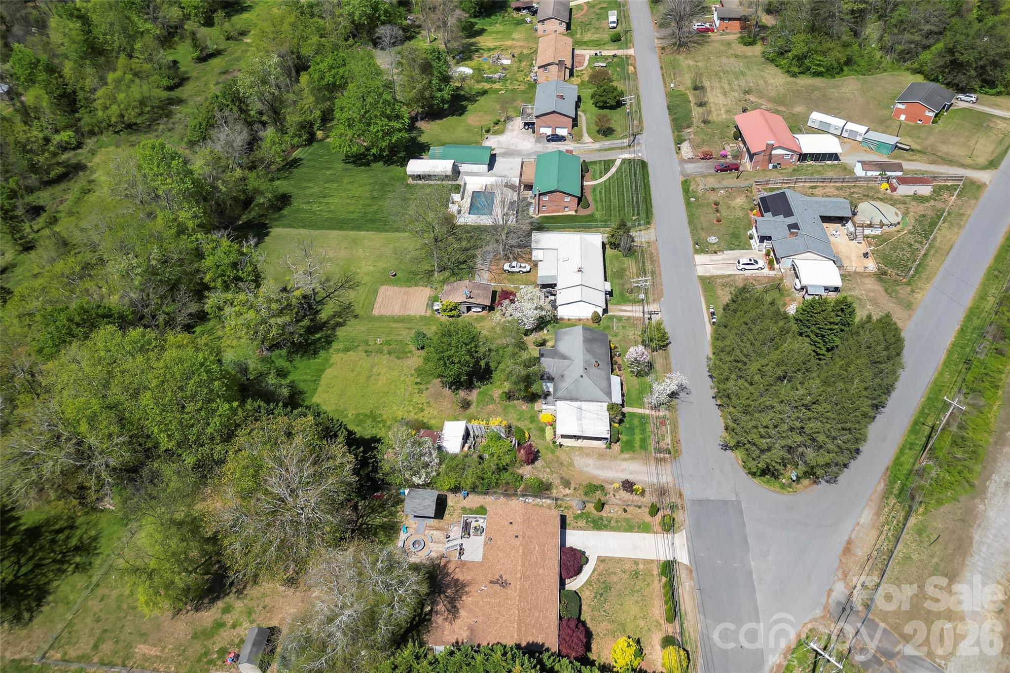 428 Melrose Street Southwest Lenoir, NC 28645 - Photo 33 of 34 an aerial view of residential houses with outdoor space
