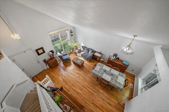 a view of a living room and dining room