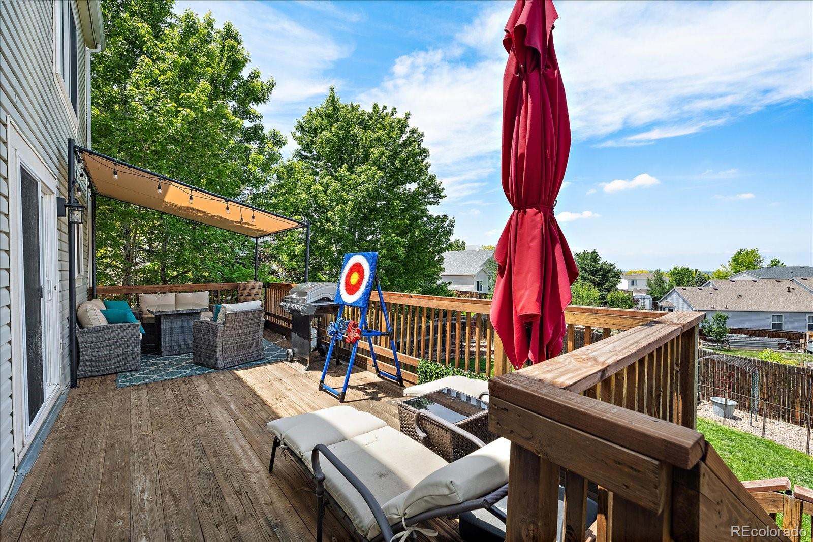 22379 East Dorado Avenue Aurora, CO 80015 - Photo 28 of 30 a view of deck with furniture